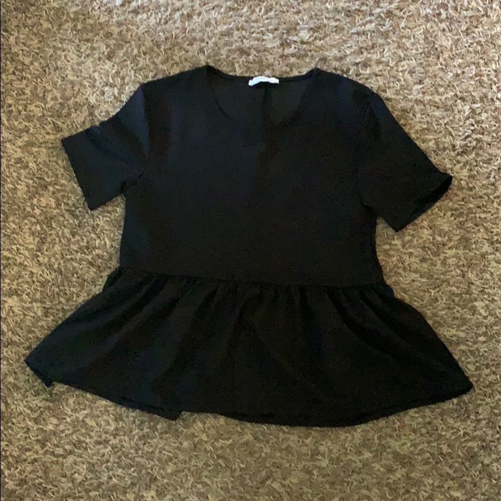 Ruffled black top